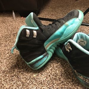 Blue and black Jordan 12s
